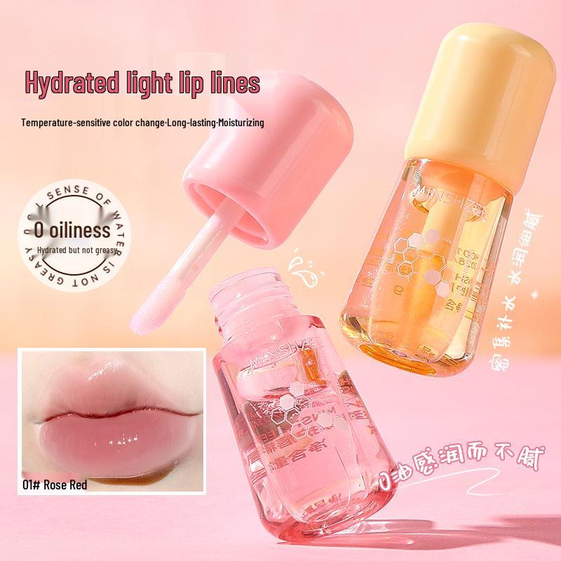 Mingxizhi Lip Essence Oil: Hydrating & Moisturizing Balm, Reduces Lip Lines, Anti-Cracking Care 2g
Mingxizhi Lip Essence Oil: Hydrating & Moisturizing Balm, Reduces Lip Lines, Anti-Cracking Care 2g