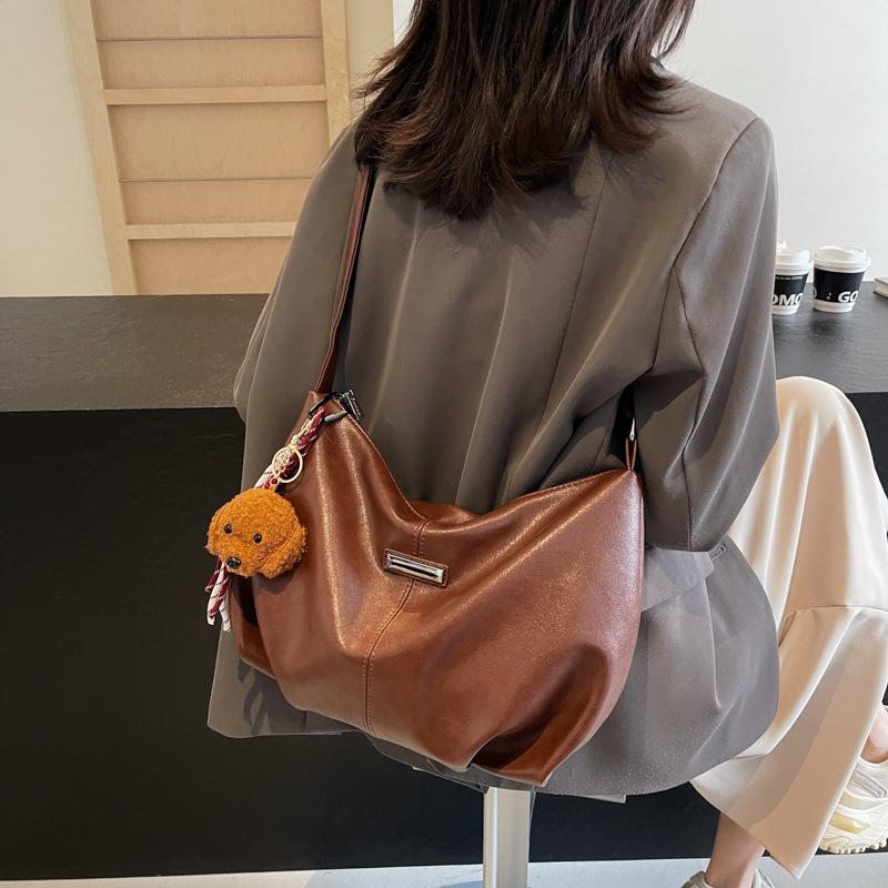 This year s popular niche design bag 2025 new women s bag autumn fashion trend messenger bag shoulder tote bag 35*12*23 темно-коричневого кольору
This year s popular niche design bag 2025 new women s bag autumn fashion trend messenger bag shoulder tote bag 35*12*23 темно-коричневого кольору