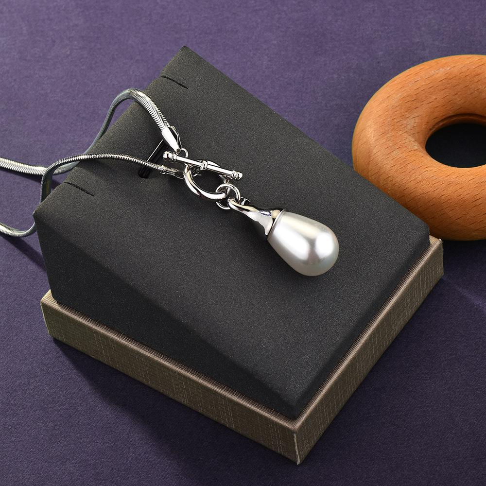 Элегантное длинное геометрическое ожерелье для женщин с уникальными жемчужинами в форме капли воды и стильными металлическими элементами серебряный
Элегантное длинное геометрическое ожерелье для женщин с уникальными жемчужинами в форме капли воды и стильными металлическими элементами серебряный