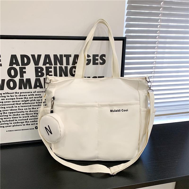 Crossbody canvas bag New American retro shoulder bag Large capacity student class bag Tote bag Commuter messenger bag
Crossbody canvas bag New American retro shoulder bag Large capacity student class bag Tote bag Commuter messenger bag
