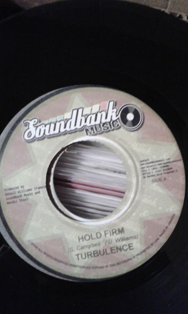 7inch Record TURBULENCE - Hold Firm NONE Soundbank Music France Reggae, Ska & Dub Used
7inch Record TURBULENCE - Hold Firm NONE Soundbank Music France Reggae, Ska & Dub Used