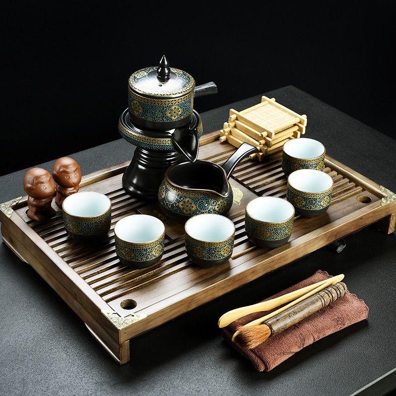 Zisha Ceramic Gongfu Tea Set with Solid Wood Drawer Tray
Zisha Ceramic Gongfu Tea Set with Solid Wood Drawer Tray