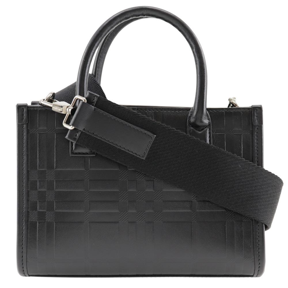 BURBERRY Embossed Check Handbag 2WAYShoulder black Calfskin Women Used
BURBERRY Embossed Check Handbag 2WAYShoulder black Calfskin Women Used