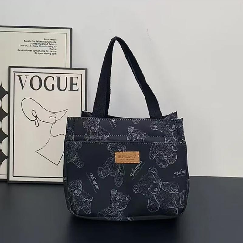 Cartoon Cute Bear Printed Pattern Versatile Handbag Office Worker Lunch Bag Oxford Cloth Portable Tote Bag
Cartoon Cute Bear Printed Pattern Versatile Handbag Office Worker Lunch Bag Oxford Cloth Portable Tote Bag
