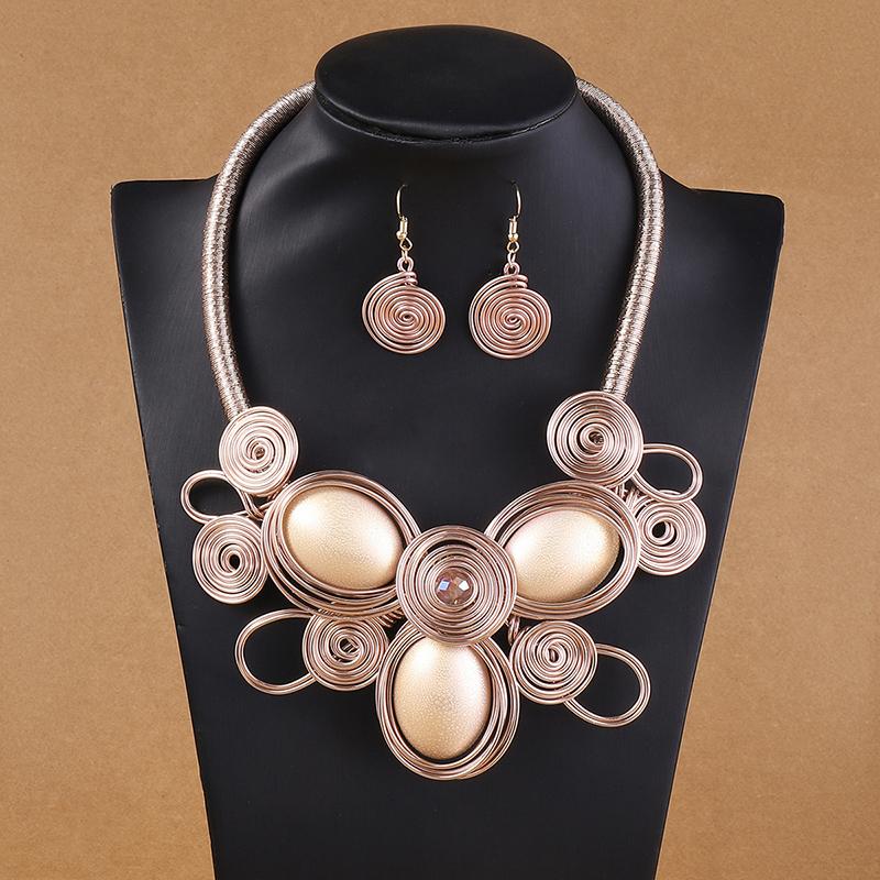 Преувеличенные алюминиевые цветы, разноцветный циркон, набор для женщин, африканское свадебное колье, набор серег, праздничные ювелирные изделия, подарки розового золота
Преувеличенные алюминиевые цветы, разноцветный циркон, набор для женщин, африканское свадебное колье, набор серег, праздничные ювелирные изделия, подарки розового золота