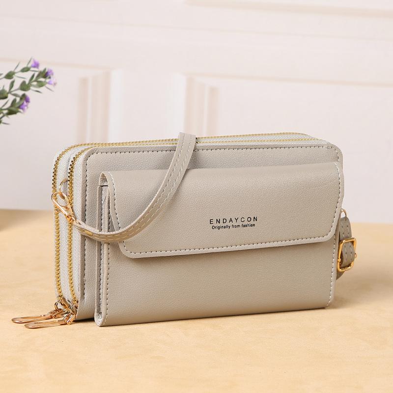 New women s messenger bag Korean version fashion shoulder bag versatile large capacity double zipper mobile phone bag wholesale серый
New women s messenger bag Korean version fashion shoulder bag versatile large capacity double zipper mobile phone bag wholesale серый