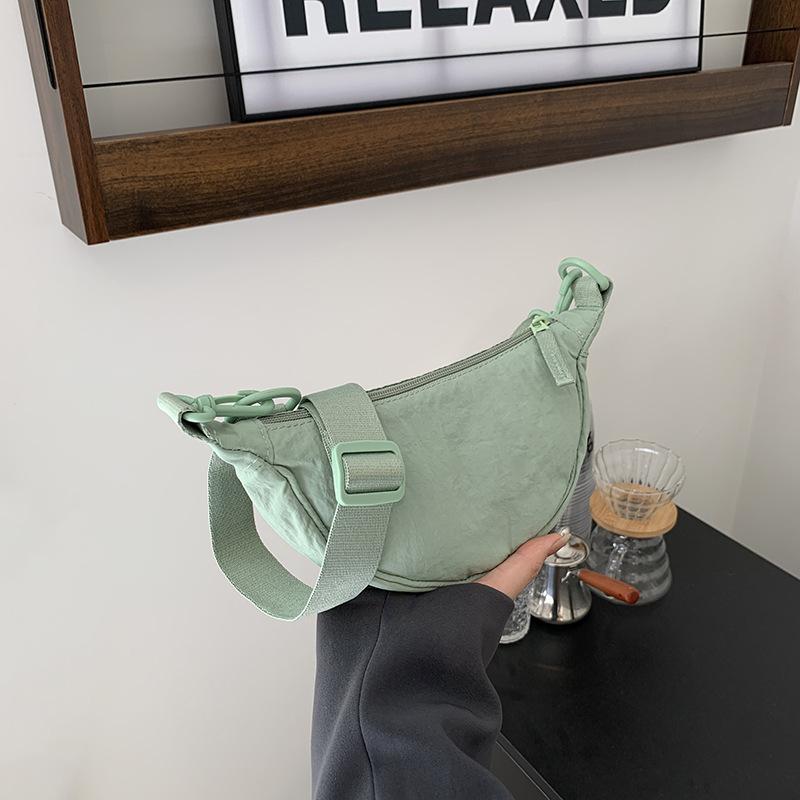 Nylon Simple Dumpling Bag, Foreign Style Shoulder Messenger Bag, Fashion Trend, Large Capacity Mobile Phone Bag світло-зелений колір
Nylon Simple Dumpling Bag, Foreign Style Shoulder Messenger Bag, Fashion Trend, Large Capacity Mobile Phone Bag світло-зелений колір