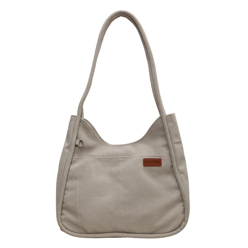 Простая нишевая холщовая сумка, новая женская ретро-сумка через плечо большой вместимости, текстурированная сумка-багет для женщин покинуть белый