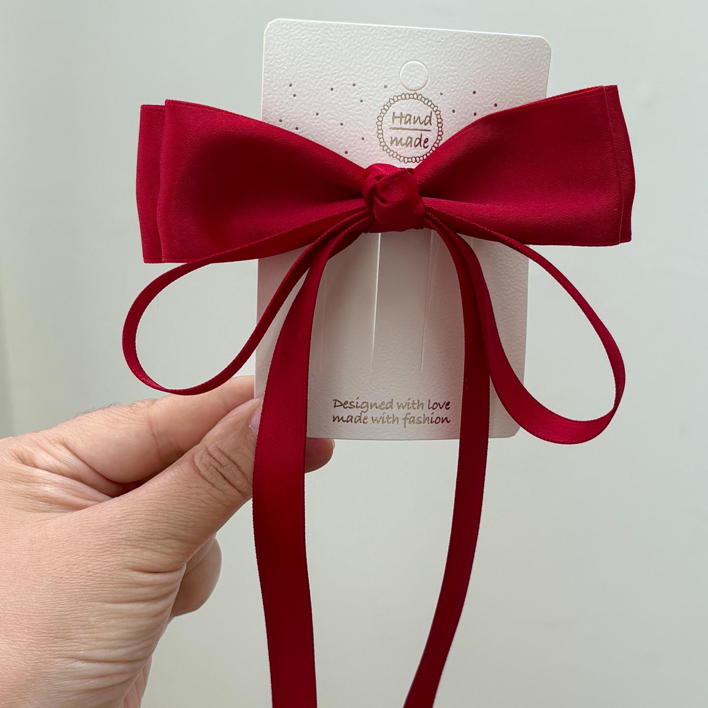 Korean Style Wine Red Bow Hair Clip with Flowing Ribbons for Girls
Korean Style Wine Red Bow Hair Clip with Flowing Ribbons for Girls