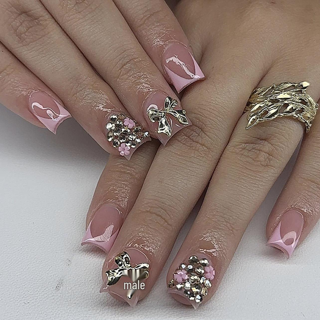 Short Square French Pink False Nails with 3D Metal Bow and Glitter Sparkle Nail Art.
Short Square French Pink False Nails with 3D Metal Bow and Glitter Sparkle Nail Art.