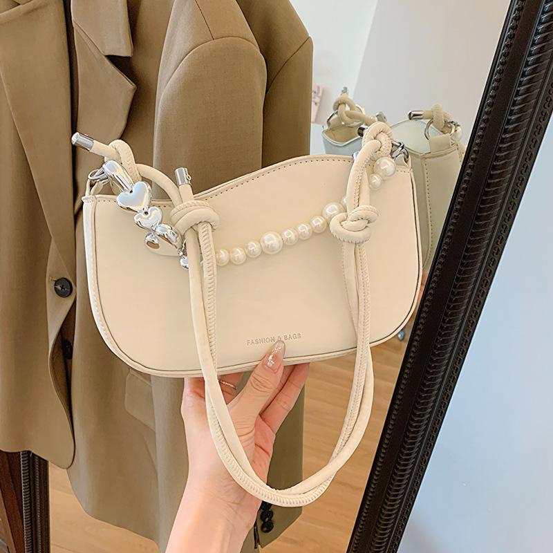 High-value pearl chain small bag women s 2025 spring and summer new niche crossbody small bag fashion shoulder armpit bag
High-value pearl chain small bag women s 2025 spring and summer new niche crossbody small bag fashion shoulder armpit bag