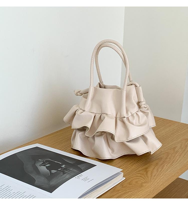 Versatile Underarm Bag Lotus Leaf Edge Portable Petal Bucket Bag Crossbody Skirt Bag
Versatile Underarm Bag Lotus Leaf Edge Portable Petal Bucket Bag Crossbody Skirt Bag