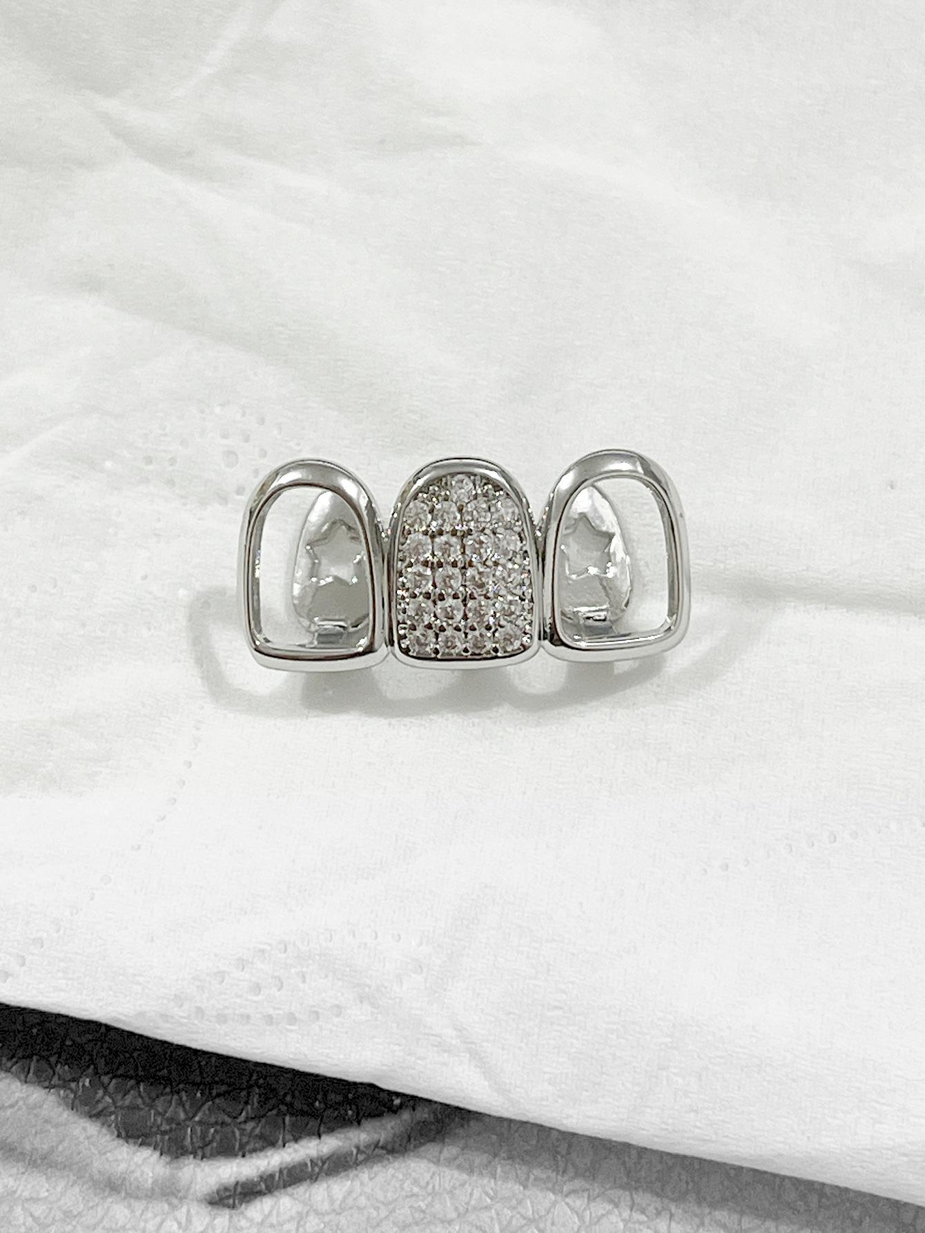 Hollow Arc Copper Zirconia Hip Hop Grillz Tooth Jewelry
Hollow Arc Copper Zirconia Hip Hop Grillz Tooth Jewelry