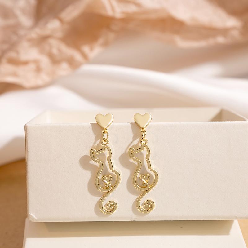 Silver Needle Cute Cat Earrings: Simple Japanese & Korean Design, Hollow Animal Style, Sweet & Gentle for Women.
Silver Needle Cute Cat Earrings: Simple Japanese & Korean Design, Hollow Animal Style, Sweet & Gentle for Women.