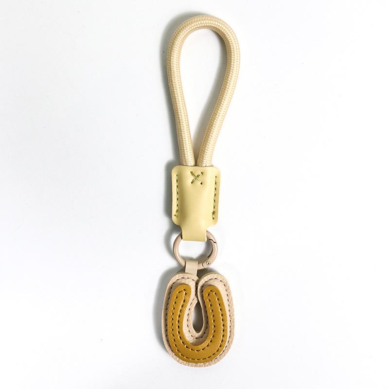 High-End Leather Alphabet Keychain Bag Pendant
High-End Leather Alphabet Keychain Bag Pendant