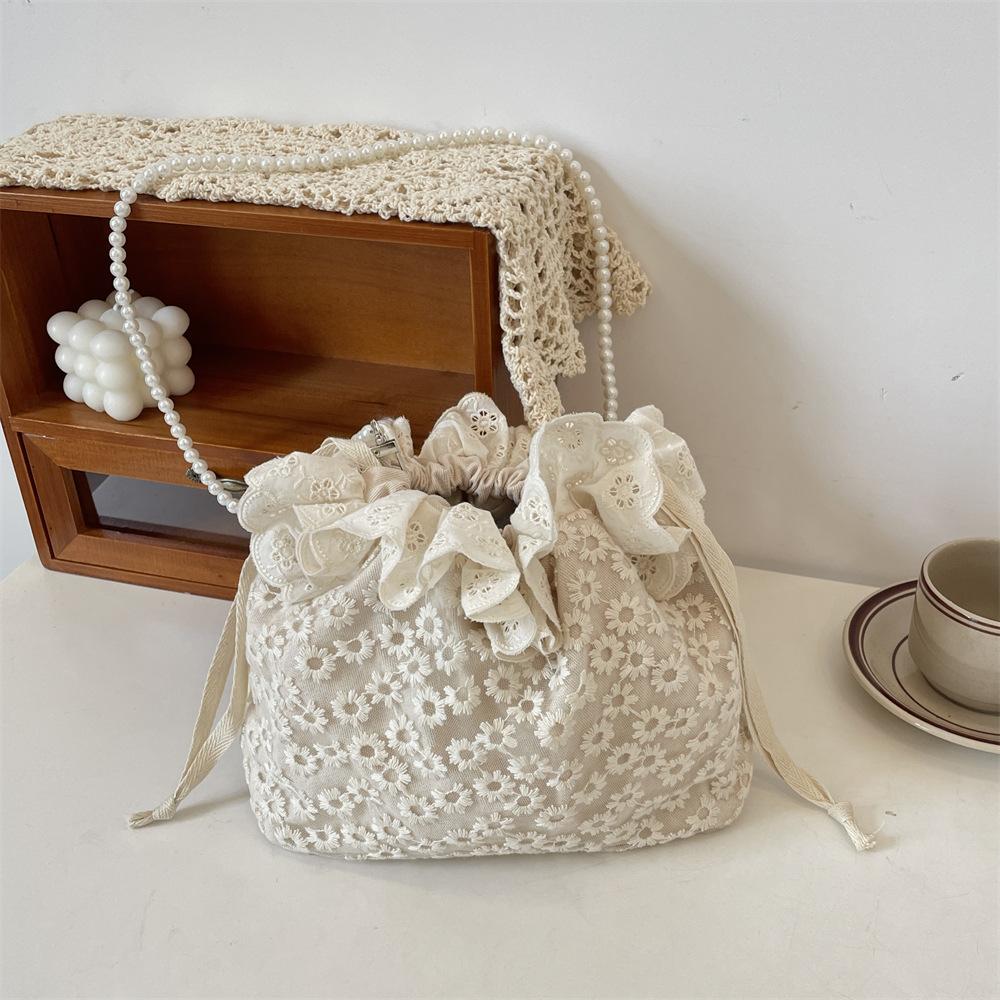 Новая модная кружевная универсальная сумка-ведро на кулиске, на плечо, сумка-мессенджер, женская маленькая сумка с жемчужной полосой
Новая модная кружевная универсальная сумка-ведро на кулиске, на плечо, сумка-мессенджер, женская маленькая сумка с жемчужной полосой