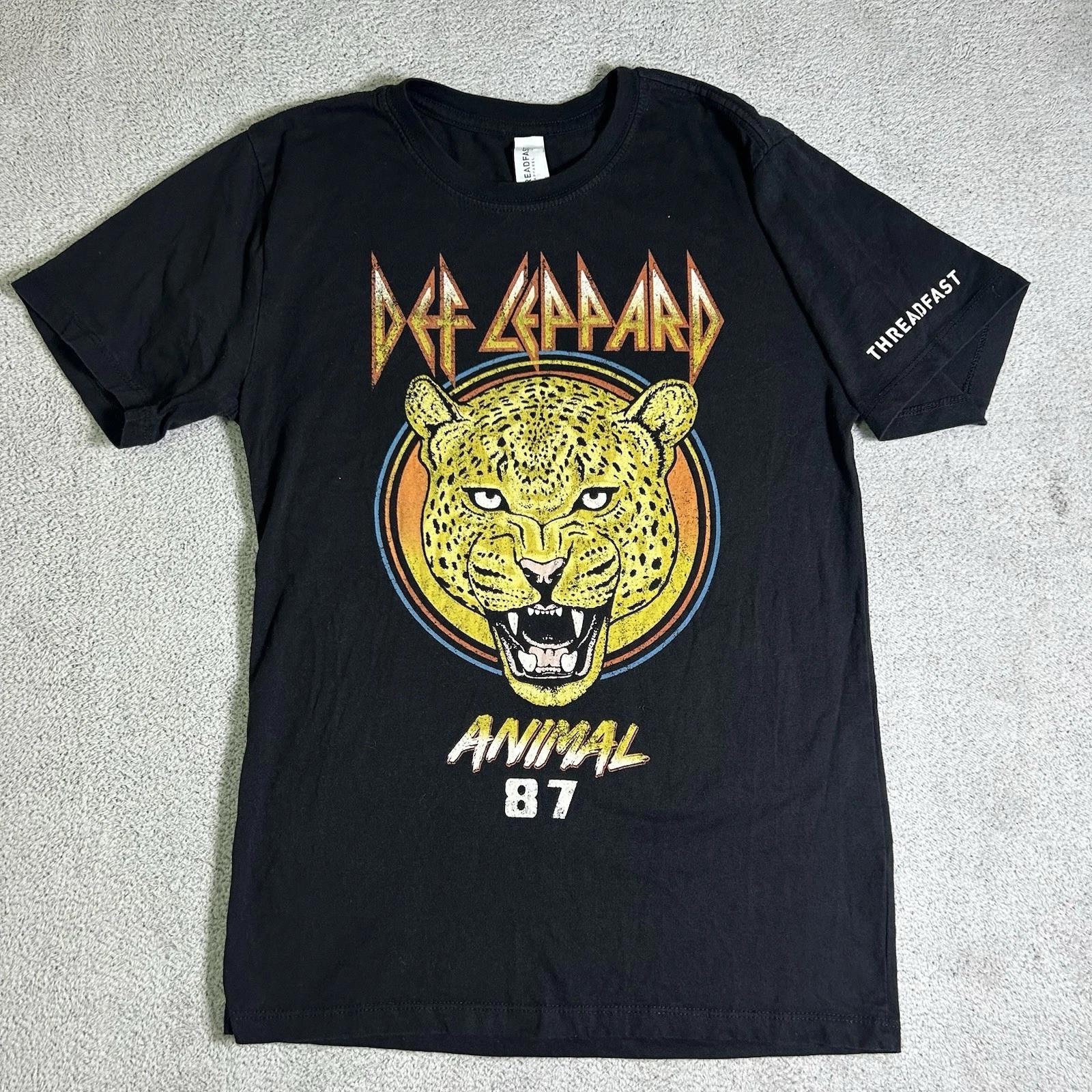Threadfast Def Leppard Animal 87 Graphic Shirt Adult Small Black Short Sleeve 4XL
Threadfast Def Leppard Animal 87 Graphic Shirt Adult Small Black Short Sleeve 4XL