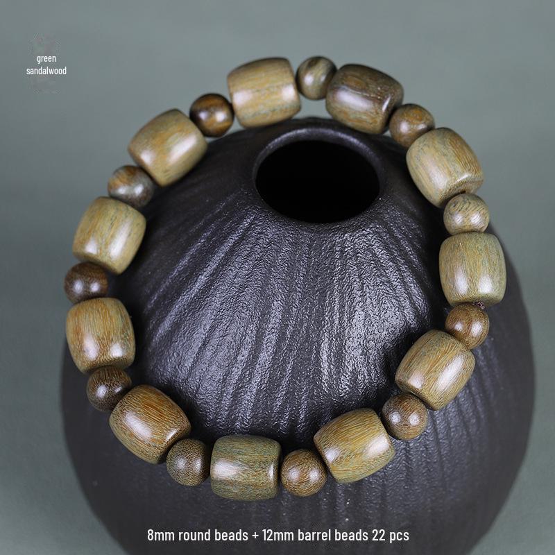 Браслет из буддийских бусин зеленого сандалового дерева и черного палисандра — унисекс-дизайн в форме бочки
Браслет из буддийских бусин зеленого сандалового дерева и черного палисандра — унисекс-дизайн в форме бочки