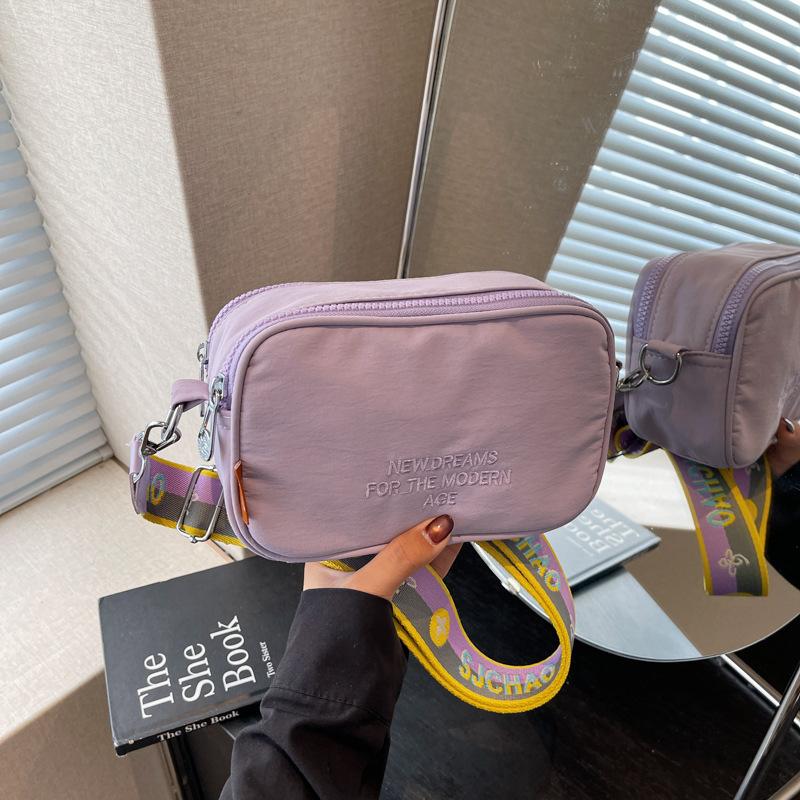 summer versatile new camera bag fashionable canvas high-end niche messenger small square bag фиолетовый
summer versatile new camera bag fashionable canvas high-end niche messenger small square bag фиолетовый