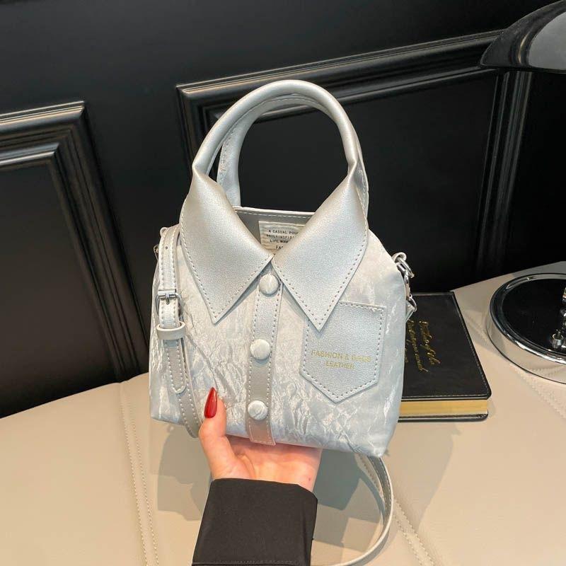 Niche design casual bag women s new fashion personality simple shoulder messenger bag portable versatile black E
Niche design casual bag women s new fashion personality simple shoulder messenger bag portable versatile black E