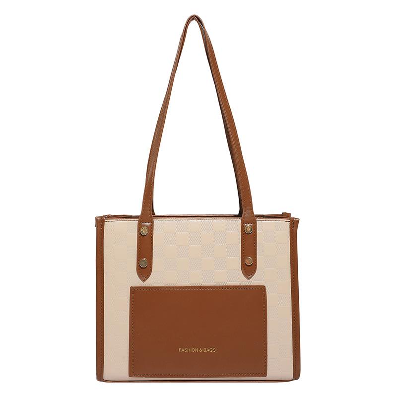 Simple handbag summer new shoulder bag tote bag large capacity contrasting color splicing temperament commuter women s bag
Simple handbag summer new shoulder bag tote bag large capacity contrasting color splicing temperament commuter women s bag