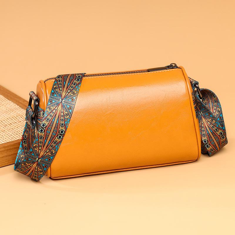 Retro solid color women s bag 2025 new wide shoulder strap cylinder bag personalized fashion shoulder bag women
Retro solid color women s bag 2025 new wide shoulder strap cylinder bag personalized fashion shoulder bag women