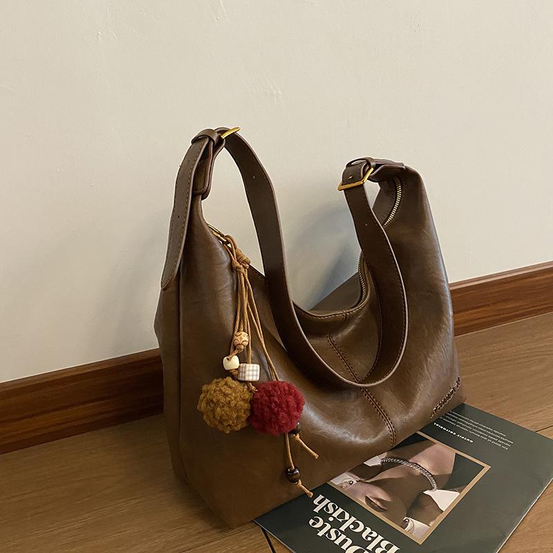 Retro tote bag women s autumn new fashion simple large capacity underarm dumpling bag shoulder messenger bag Without pendant коричневый
Retro tote bag women s autumn new fashion simple large capacity underarm dumpling bag shoulder messenger bag Without pendant коричневый