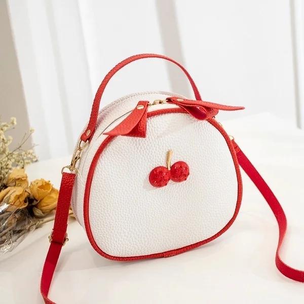 New Litchi Pattern Contrast Color Cherry Small Backpack Women s One-shoulder Messenger Mobile Phone Bag белый
New Litchi Pattern Contrast Color Cherry Small Backpack Women s One-shoulder Messenger Mobile Phone Bag белый