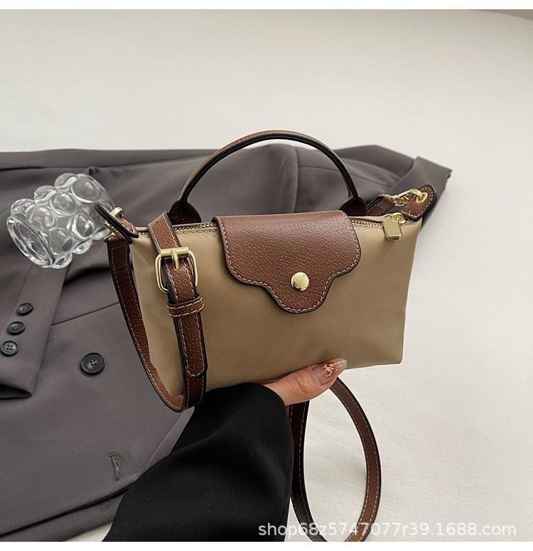 Casual handheld nylon cloth bag women s 2025 new simple fashion commuter bag niche versatile one-shoulder crossbody bag хаки
Casual handheld nylon cloth bag women s 2025 new simple fashion commuter bag niche versatile one-shoulder crossbody bag хаки