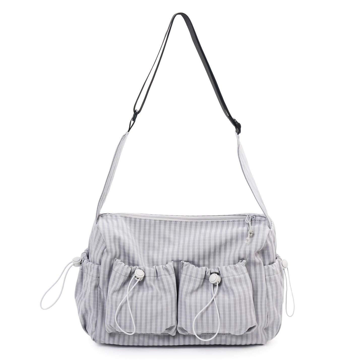 Simple plaid couple nylon bag women s large-capacity commuting shoulder bag pleated lightweight messenger bag серый
Simple plaid couple nylon bag women s large-capacity commuting shoulder bag pleated lightweight messenger bag серый