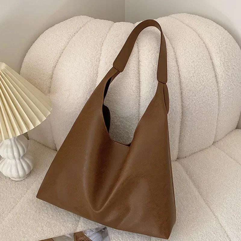 PU Soft Leather Tote Bag Lightweight Large Capacity Women Big Shoulder Bag Underarm Bag Hasp Closure Casual Style Commuting Bags 38X11X38CM
PU Soft Leather Tote Bag Lightweight Large Capacity Women Big Shoulder Bag Underarm Bag Hasp Closure Casual Style Commuting Bags 38X11X38CM