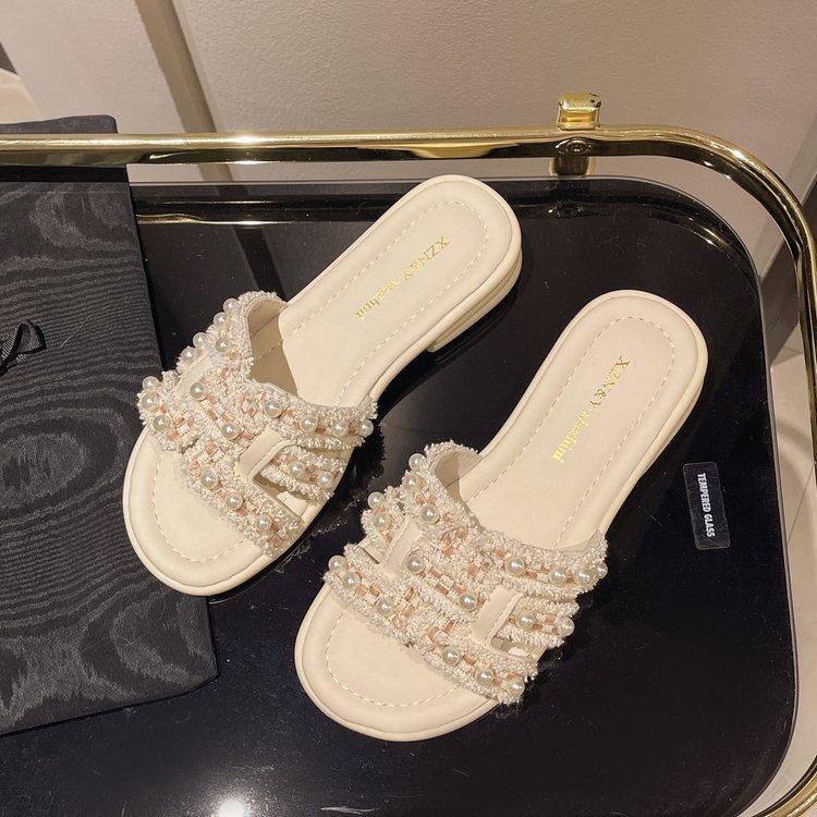 2025 summer new Xiaoxiangfeng pearl slippers women s wear flat bottom one-word drag versatile beach sandals with skirt 35
2025 summer new Xiaoxiangfeng pearl slippers women s wear flat bottom one-word drag versatile beach sandals with skirt 35