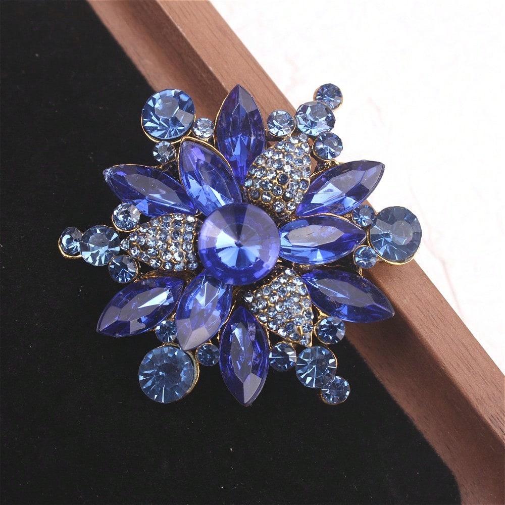 Gold-Tone Blue Crystal Floral Brooch - Blue Rhinestones, Vintage Luxurious Design, for Formal Events Enthusiasts, Ideal Gift
Gold-Tone Blue Crystal Floral Brooch - Blue Rhinestones, Vintage Luxurious Design, for Formal Events Enthusiasts, Ideal Gift