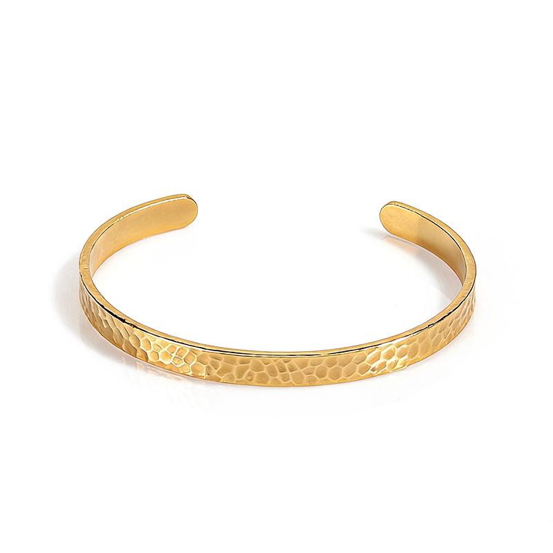 European Unisex Titanium Steel Gold Open Bracelet with Concave and Convex Design
European Unisex Titanium Steel Gold Open Bracelet with Concave and Convex Design
