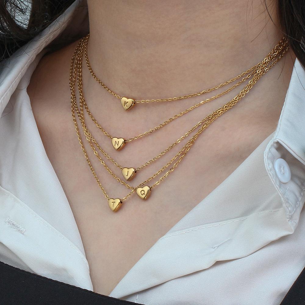 Ladies Minimalist Small Love Initial Necklace Jewelry Stainless Steel 18k Gold Plated Mini Heart Shape Letter Pendant Necklace
Ladies Minimalist Small Love Initial Necklace Jewelry Stainless Steel 18k Gold Plated Mini Heart Shape Letter Pendant Necklace
