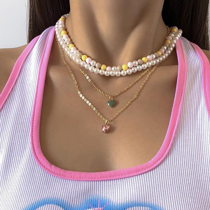 Light Luxury Gemstone Love Pendant, Collarbone Necklace, Sweet And Cool Wind Dripping Oil Imitation Pearl Stacking Necklace.
Light Luxury Gemstone Love Pendant, Collarbone Necklace, Sweet And Cool Wind Dripping Oil Imitation Pearl Stacking Necklace.