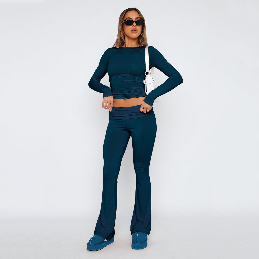 Women s Set Casual Sports Comfortable Slim Solid Color Long-sleeved Round Neck Navel-baring T-shirt Low-waist Flared Pants 2-piece Set Clothes Sale XL темно-синього кольору
Women s Set Casual Sports Comfortable Slim Solid Color Long-sleeved Round Neck Navel-baring T-shirt Low-waist Flared Pants 2-piece Set Clothes Sale XL темно-синього кольору