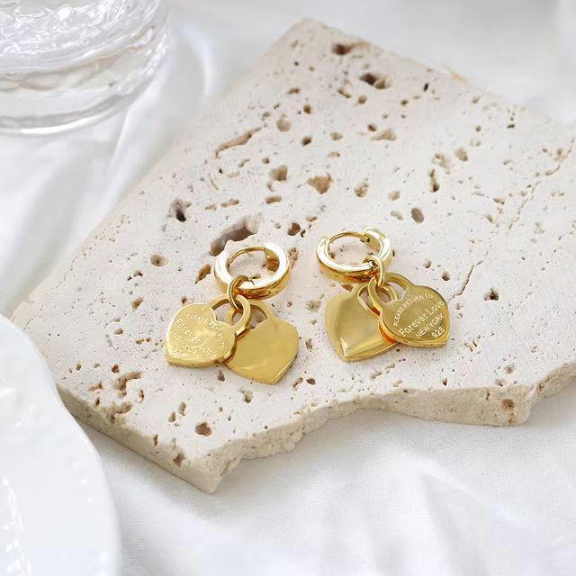 Комплект из ожерелья и серег в форме сердца из нержавеющей стали INS в европейском и американском стиле, гальваническое покрытие 18 карат, дизайн с английскими буквами
Комплект из ожерелья и серег в форме сердца из нержавеющей стали INS в европейском и американском стиле, гальваническое покрытие 18 карат, дизайн с английскими буквами