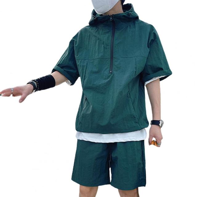 2Pcs/Set Men Casual Outfit Hooded Zipper Neckline Short Sleeve T-shirt Elastic Waist Wide Leg Shorts Set 4XL зелений
2Pcs/Set Men Casual Outfit Hooded Zipper Neckline Short Sleeve T-shirt Elastic Waist Wide Leg Shorts Set 4XL зелений