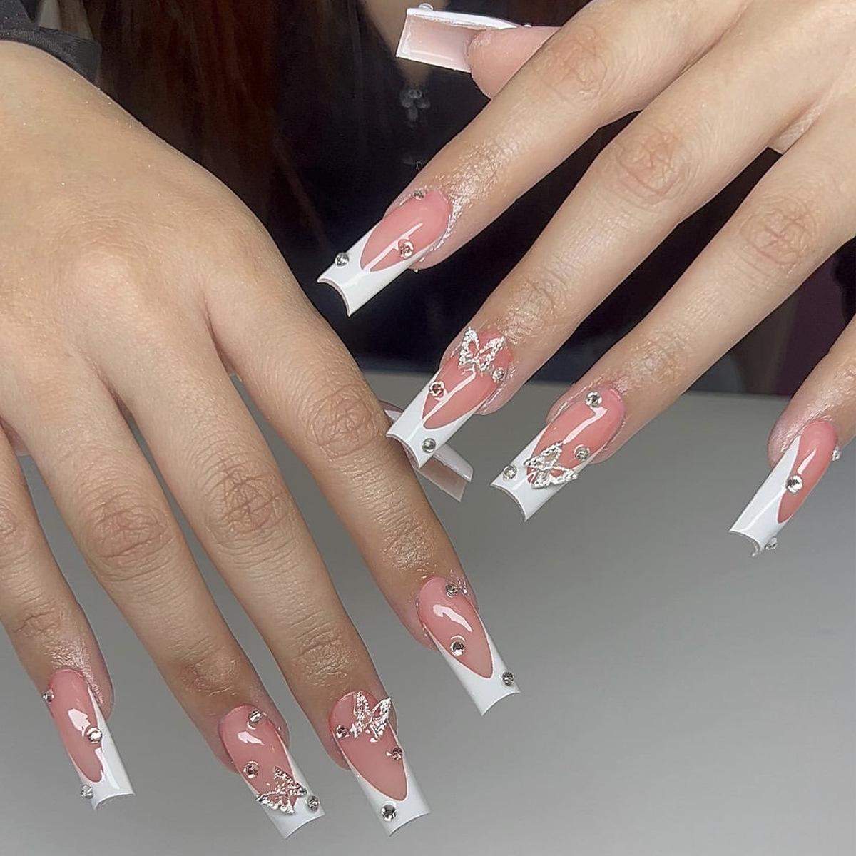 Medium-Long Rhinestone Butterfly French Tip Fake Nails — White Wearable Nail Art Pieces
Medium-Long Rhinestone Butterfly French Tip Fake Nails — White Wearable Nail Art Pieces