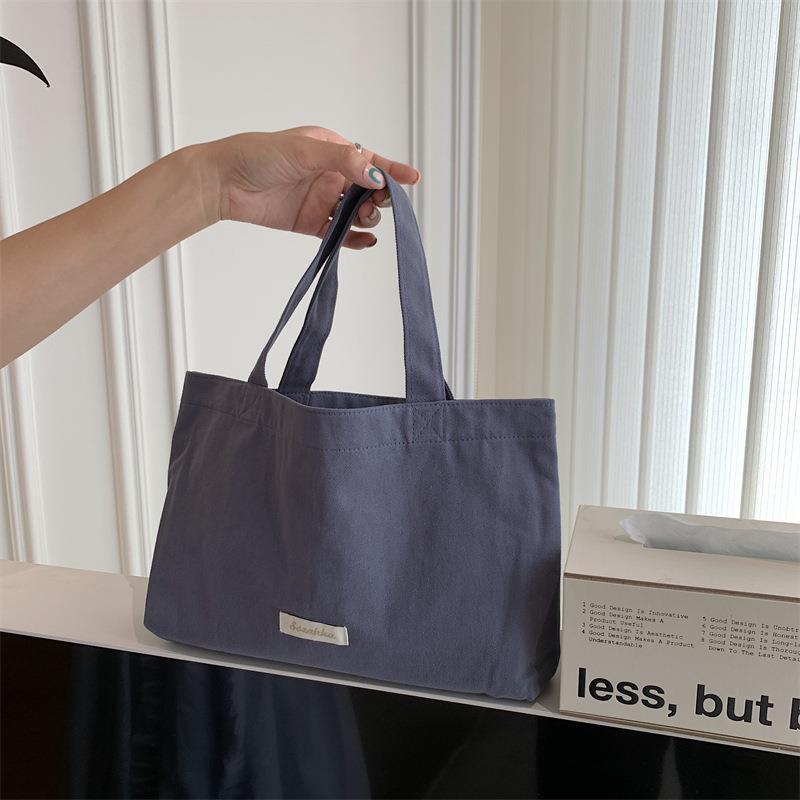 Полотенна сумка Жіноча універсальна повсякденна сумка Сумка Bento Нова тканинна сумка Сумка для покупок на вихід сірий колір
Полотенна сумка Жіноча універсальна повсякденна сумка Сумка Bento Нова тканинна сумка Сумка для покупок на вихід сірий колір