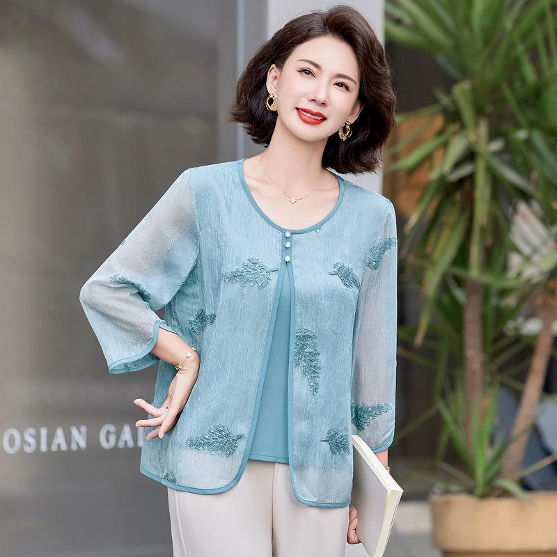 Summer Nine-Sleeve Blouse for Mature Women, Chic Two-Piece Look, 50s Mom Style, Belly Covering Chiffon Top XL (90-105 jin) синий
Summer Nine-Sleeve Blouse for Mature Women, Chic Two-Piece Look, 50s Mom Style, Belly Covering Chiffon Top XL (90-105 jin) синий