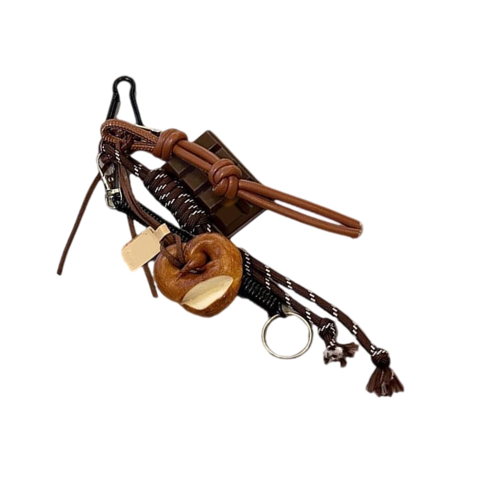 Прочный брелок в форме кренделя Подвесной модный аксессуар Добавляет веселья украшению вашего брелка Легко установить Стильные наряды 1
Прочный брелок в форме кренделя Подвесной модный аксессуар Добавляет веселья украшению вашего брелка Легко установить Стильные наряды 1