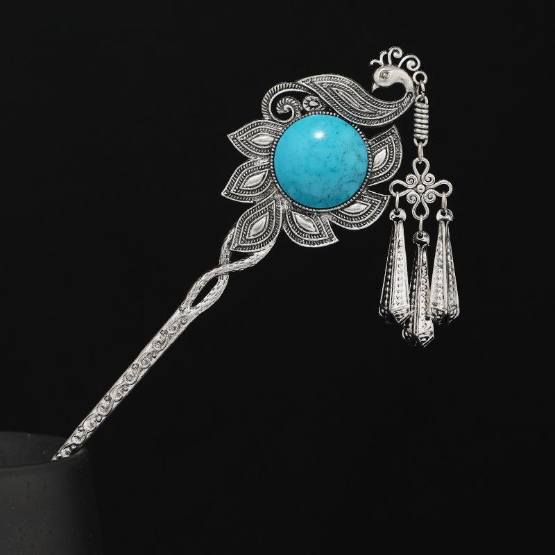 Retro Chinese ethnic style hairpin Miao peacock fringed step hairpin disc hair hairpin hair accessories women s headdress
Retro Chinese ethnic style hairpin Miao peacock fringed step hairpin disc hair hairpin hair accessories women s headdress