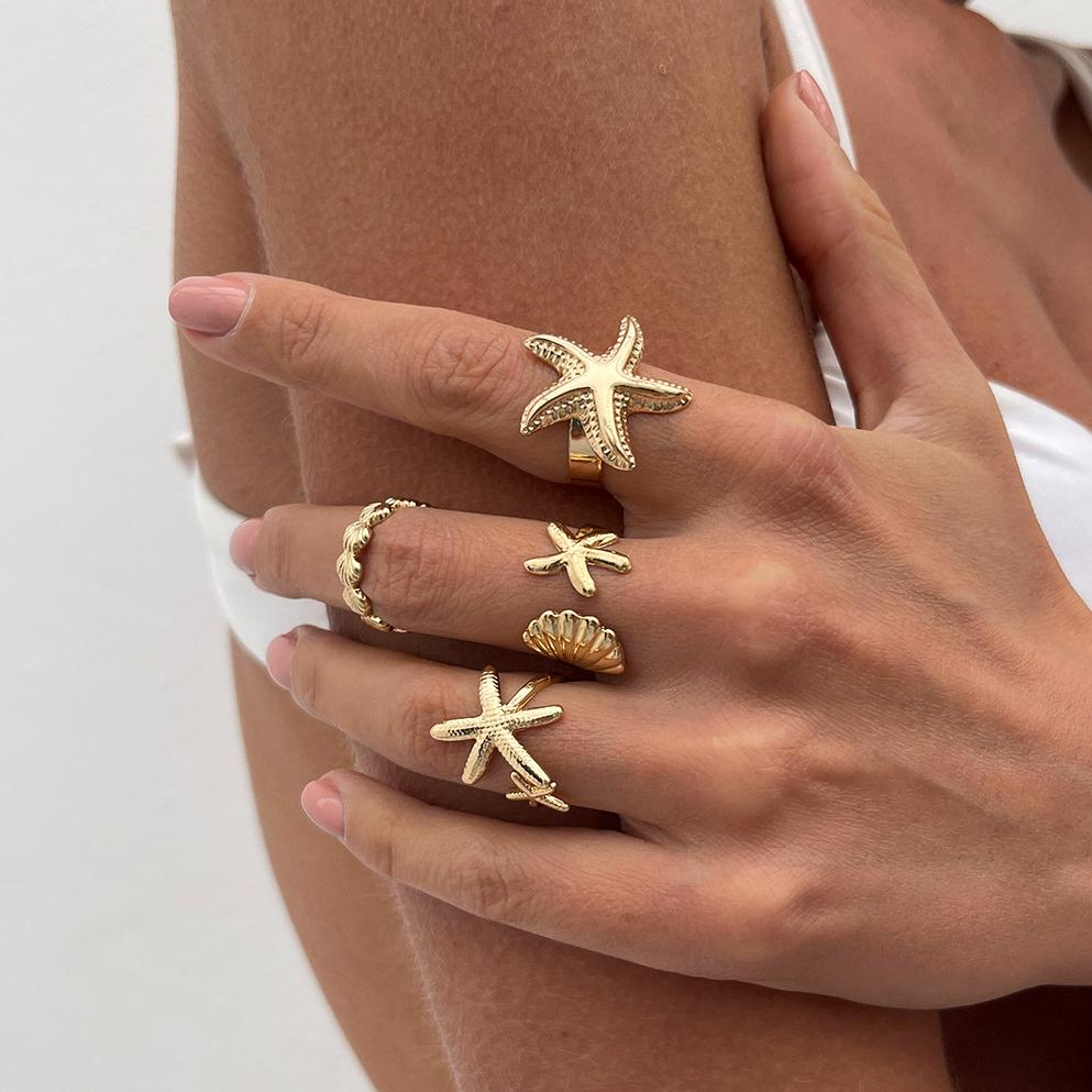 Boho Starfish Conch Gold Color Rings Set for Women Creative Irregular Hollow Metal Lines Geometric Couple Ring Vacation Zircon
Boho Starfish Conch Gold Color Rings Set for Women Creative Irregular Hollow Metal Lines Geometric Couple Ring Vacation Zircon
