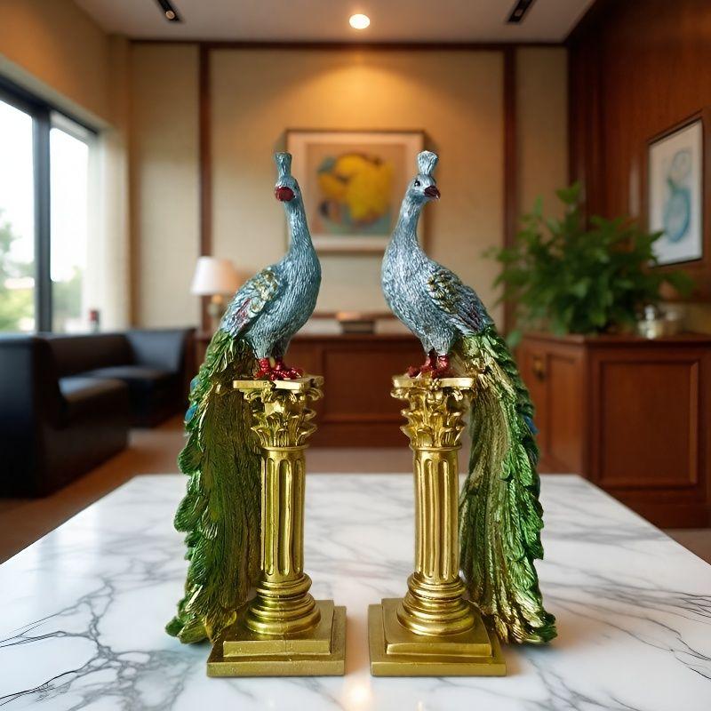 A pair of exquisite peacock ornaments standing on Roman columns add an artistic touch to the home.
A pair of exquisite peacock ornaments standing on Roman columns add an artistic touch to the home.