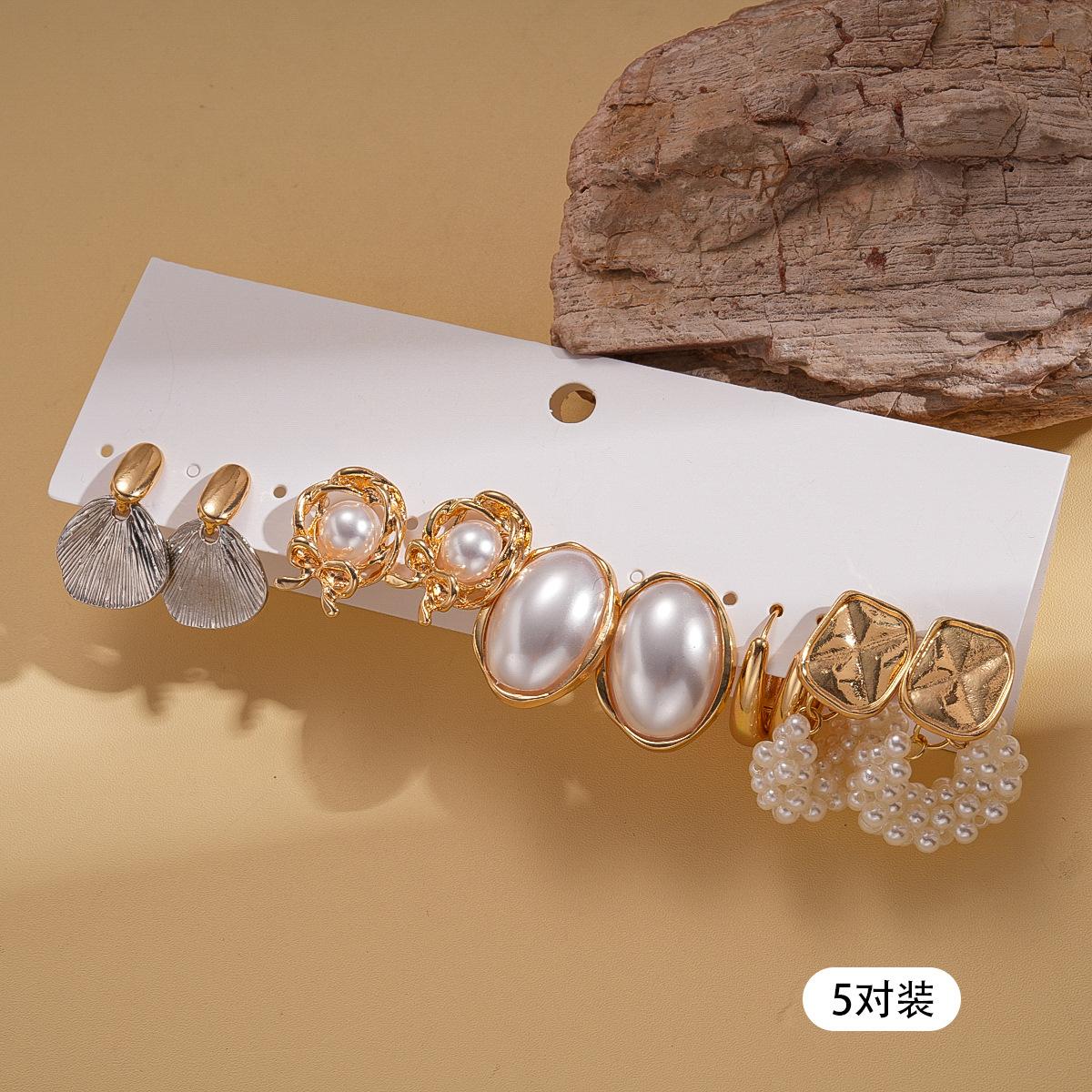 Ten-piece set of imitation pearl flower oval fan-shaped silver needle stud earrings niche earrings
Ten-piece set of imitation pearl flower oval fan-shaped silver needle stud earrings niche earrings