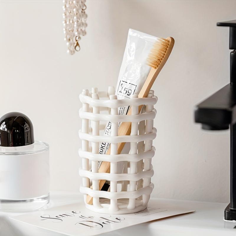 Elegant Handmade Ceramic Toothbrush Holder - Stylish White Multi-slot Design for Bathroom Finishing No Power Required
Elegant Handmade Ceramic Toothbrush Holder - Stylish White Multi-slot Design for Bathroom Finishing No Power Required