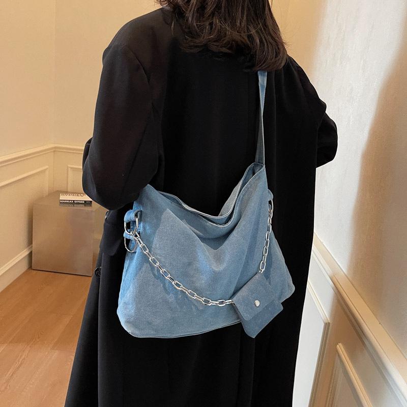 Модная повседневная джинсовая сумка-тоут женская нишевая универсальная студенческая сумка для учебы, работы, на плечо, мессенджер светло-синий
Модная повседневная джинсовая сумка-тоут женская нишевая универсальная студенческая сумка для учебы, работы, на плечо, мессенджер светло-синий