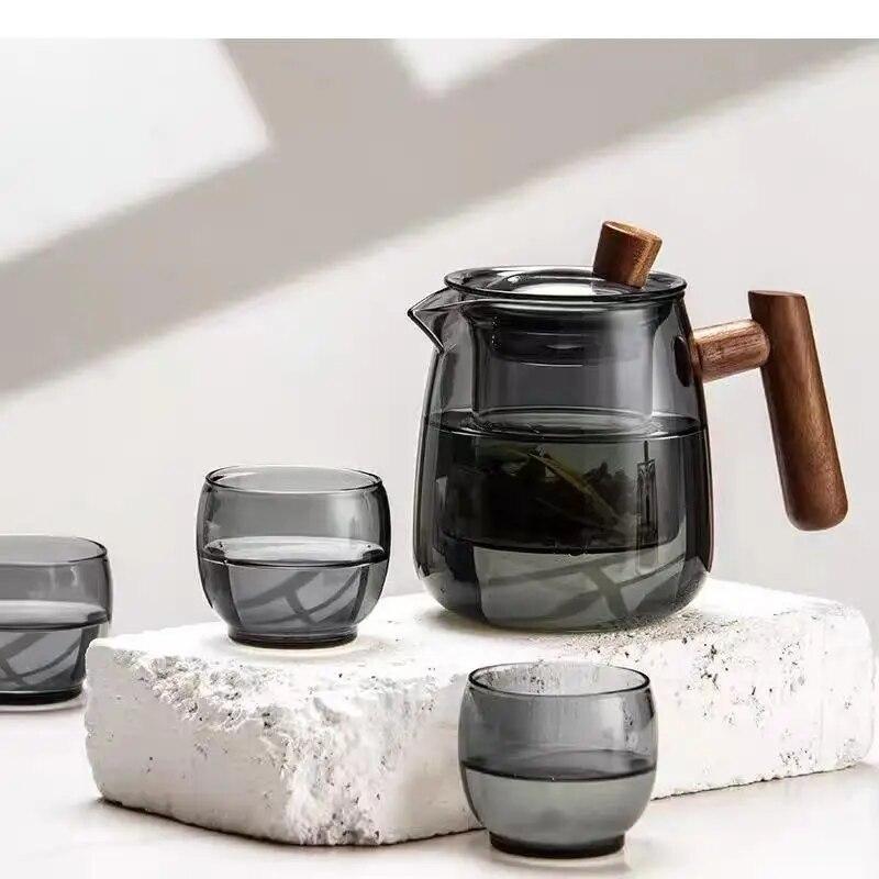 Minimalist Glass Tea Coffee Pot Handheld Type Teaware Puer Tea Cups Set Kitchen Tabletop Teacup Teapot Kettles Set Water Bottles
Minimalist Glass Tea Coffee Pot Handheld Type Teaware Puer Tea Cups Set Kitchen Tabletop Teacup Teapot Kettles Set Water Bottles
